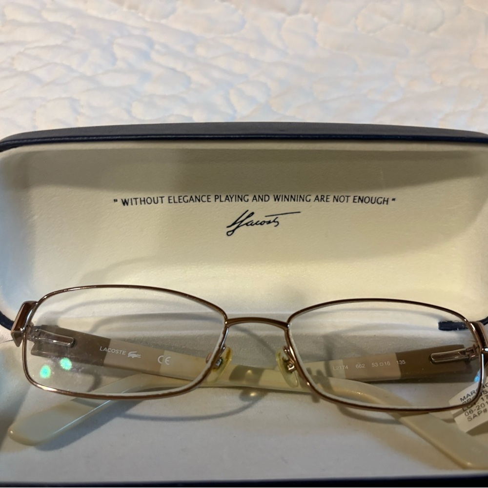 Lacoste Women's Glasses in Gold Tone